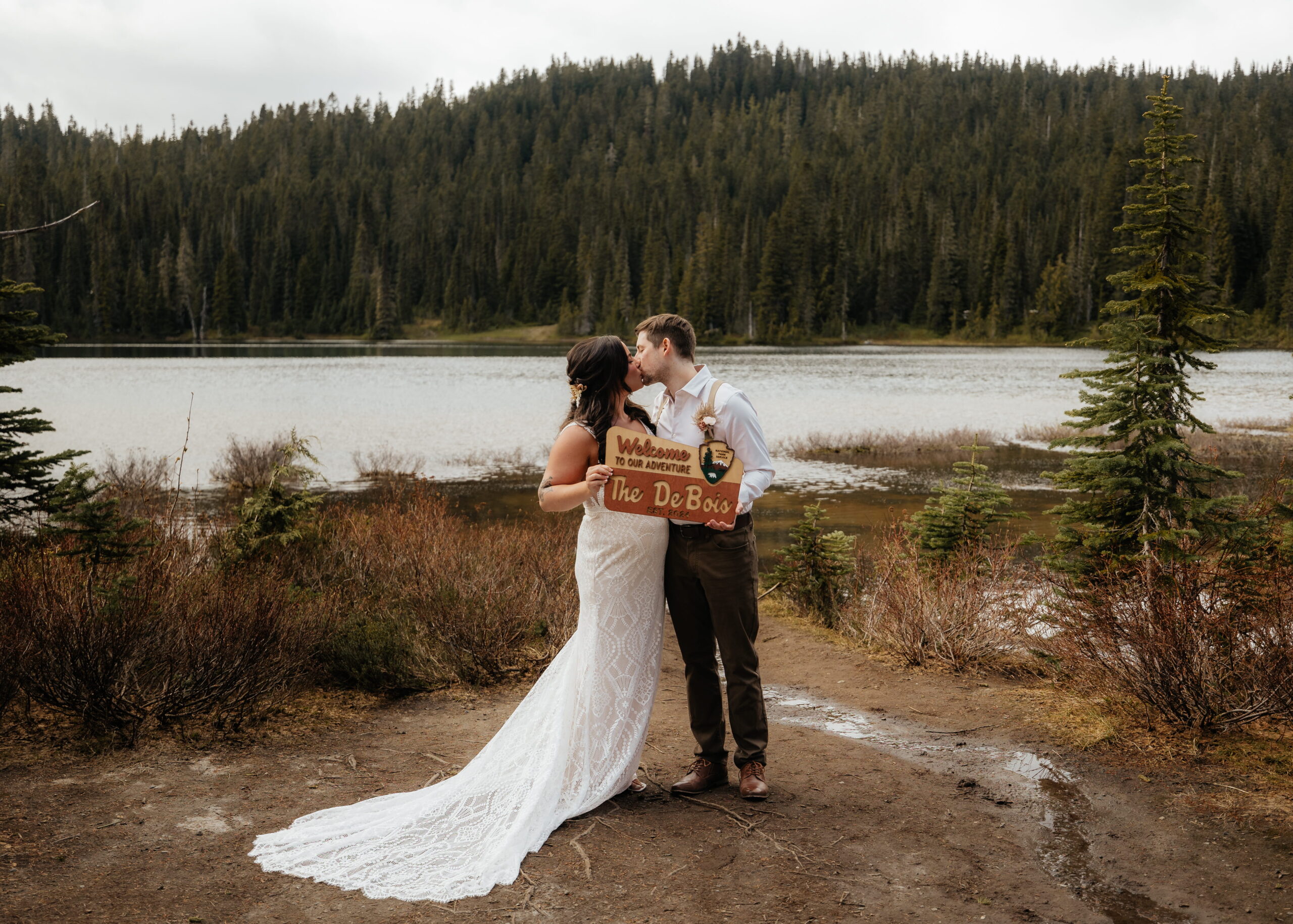 Newlyweds kiss after their Mt Rainier National Park elopement ceremony.