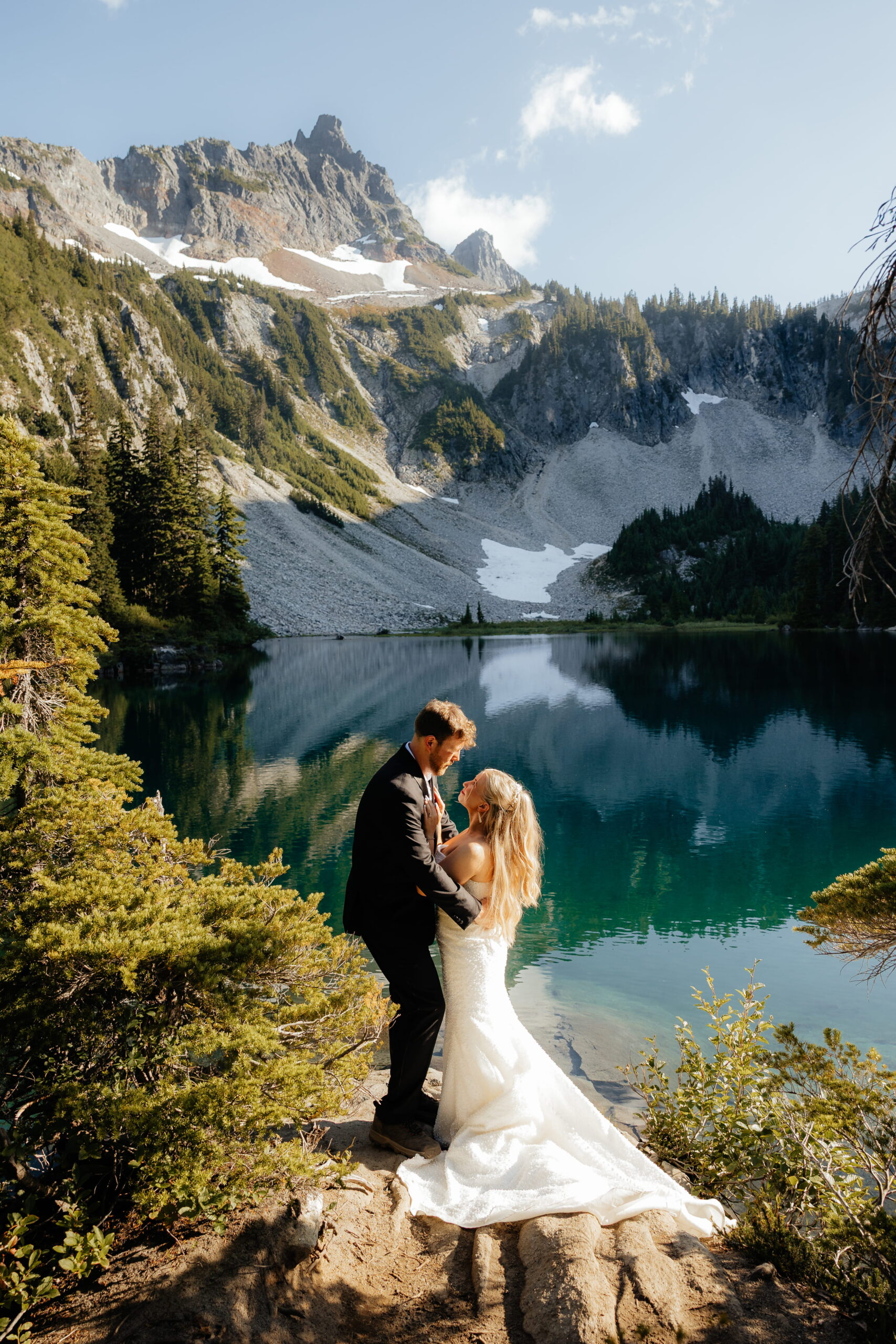 Couple hugs near Snow Lake during their Mt Rainier elopement.